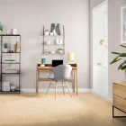 Innenaufnahme eines modern eingerichteten Arbeitszimmers mit dem Laminatboden Esprima Lona – verlegt von Heineking Raumgestaltung