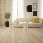 Innenaufnahme eines modern eingerichteten Wohnzimmers mit dem Laminatboden Esprima Lupo – verlegt von Heineking Raumgestaltung